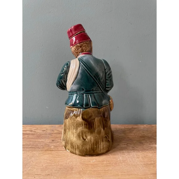Ancienne bouteille à liqueur en poterie majolique
