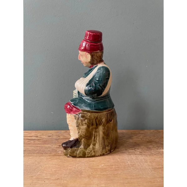 Ancienne bouteille à liqueur en poterie majolique