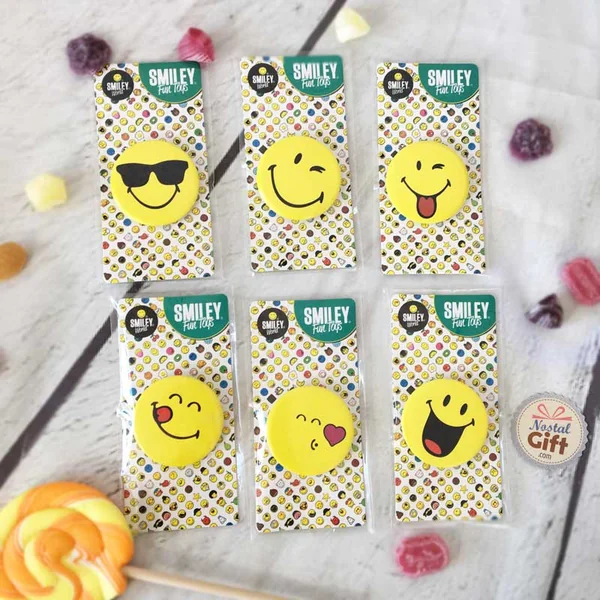 Badge Smiley qui tire la langue