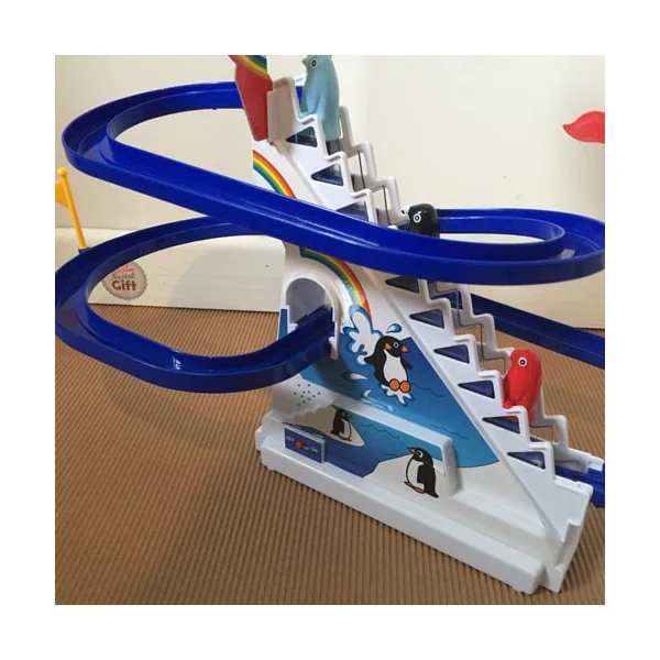 Circuit de pingouins avec escalier mécanique
