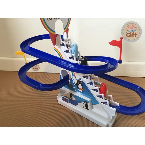 Circuit de pingouins avec escalier mécanique