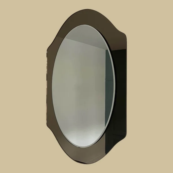 Miroir en verre fumé bicolore, vers 1970