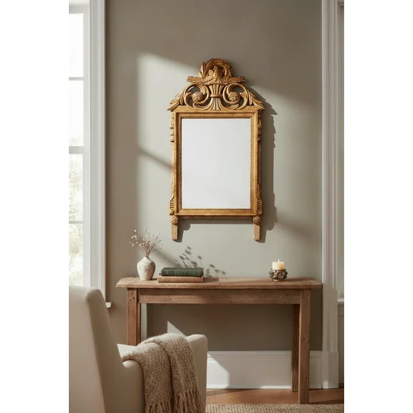 Miroir à fronton en bois doré style Louis XVI